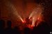 Représentation du diable sous les fumigènes rouges, lors d'un Correfoc à Barcelone.